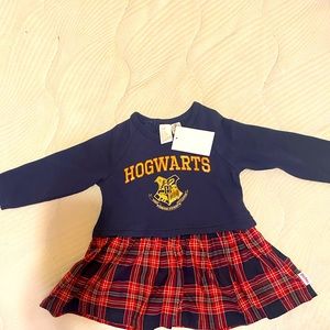 Brand new. Harry Potter baby dress. Size 12-18 months